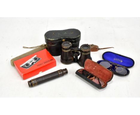 A small group of collectors' items including a miniature Meccano oil can, pocket binoculars, opera glasses, two pairs of glas
