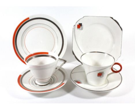 SHELLEY; two Art Deco trios, the first in 'Regent' shapes, decorated with blocks and numbered W12304, the second 'Eve' shape 