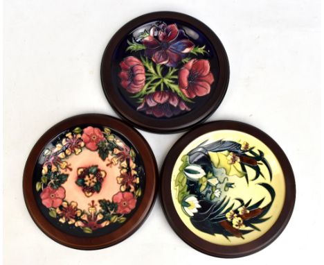 MOORCROFT; three floral tubeline decorated plates, all with impressed marks, WM monogram and various year ciphers to bases, d
