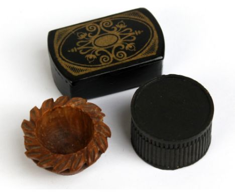 A papier-mâché snuff box with gilt decoration, a further ribbed box and miniature vessel (3).