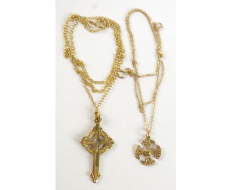 Two 9ct yellow gold cross pendants on 9ct yellow gold chains, approx 9.3g (2).Additional InformationLight surface scratches.