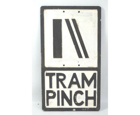 A vintage road sign 'Tram Pinch', repainted, 54 x 31cm.