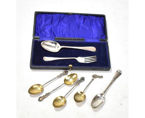 A cased christening teaspoon and fork, also four silver coffee spoons (one af) and a further teaspoons, various hallmarks.