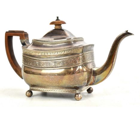 PETER &amp; WILLIAM BATEMAN; a George III hallmarked silver teapot with wooden handle and finial and band of engraved detail 