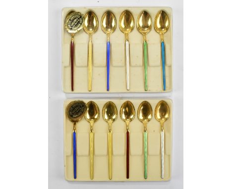 JAN TEIE ANDERSEN; two cased sets of six sterling silver gilt and enamel decorated coffee spoons.Additional InformationLight 