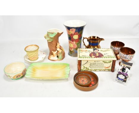 A group of decorative ceramics including a Royal Doulton floral decorated vase, musical Crown Devon box, a Royal Worcester ba