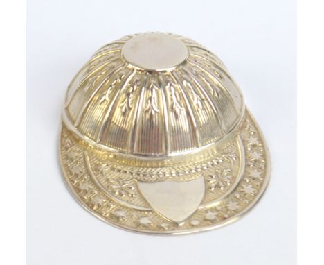 An Elizabeth II hallmarked silver jockey cap caddy spoon, Sheffield 1973, length 5.25cm.