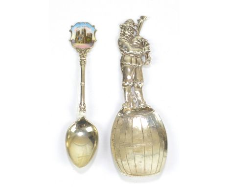 BERTHOLD MULLER; a Victorian hallmarked imported silver novelty caddy spoon in the form of a bagpipe player standing on barre