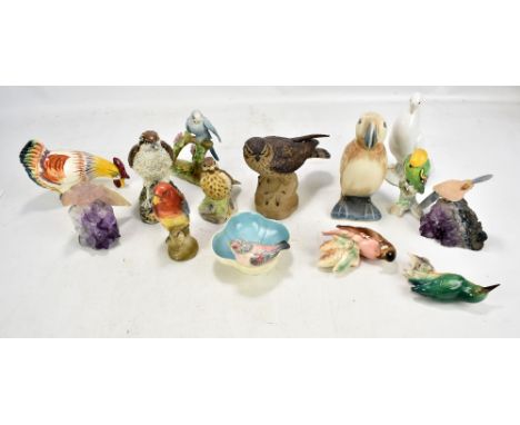 A group of bird figures with manufacturers including Nao, Goldscheider (no. 927 to base, small rim chip and repaired section 