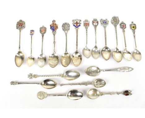 Eighteen various souvenir teaspoons some with enamel crest detail.