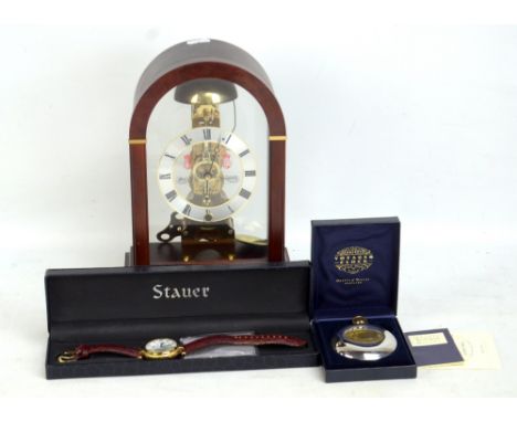 SEWILLS; a mantel clock with exposed movement, the silvered chapter ring inset with Roman numerals and further stamped to cen