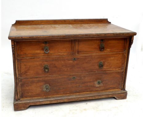 A late Victorian chest of two short and two long drawers raised on squat bracket feet.&nbsp;