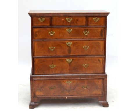 A walnut veneered chest on stand of three over four drawers on bracket feet with later top, 126 x 102cm.Additional Informatio