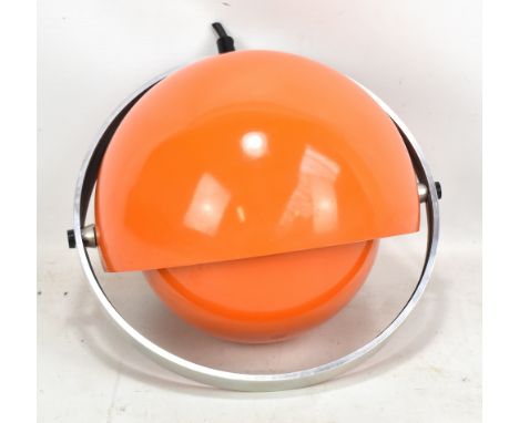 A retro orange and chromed light fitting with two graduated semicircular globes, diameter 28cm.