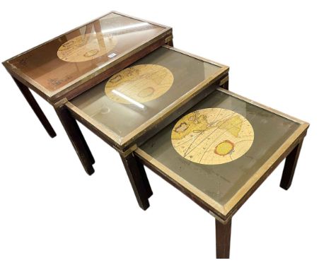 Nest of three brass bound American map decorated tables, largest 47xm x 63.5cm x 45.5cm.
