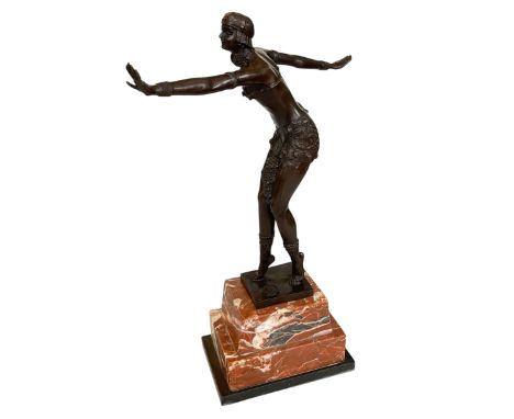 Bronze figure of an Art Deco dancer on marble plinth, 50cm high.