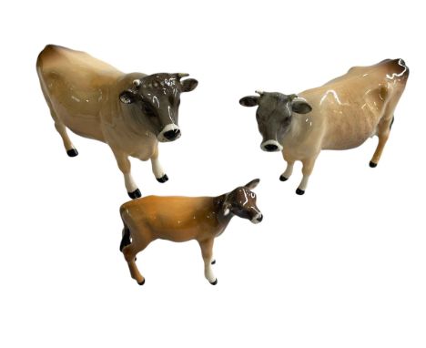Beswick Jersey bull, cow and calf.