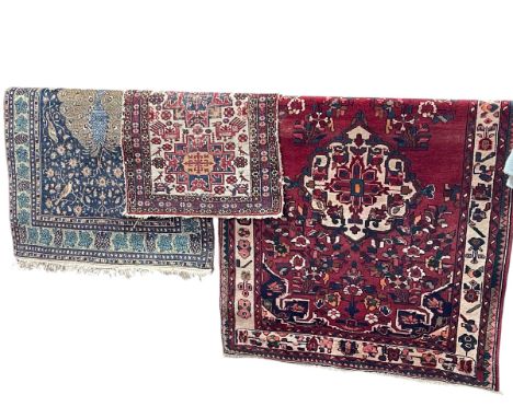 Peacock and Bird decorated rug, 1.65m x 1.09m, Persian design runner, 2.90m x 1.23m and Antique Wildlife decorated rug, 1.10m