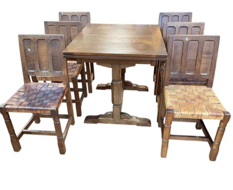 Yorkshire School 1960's eight piece oak dining suite comprising two door sideboard with central fall front above three drawer