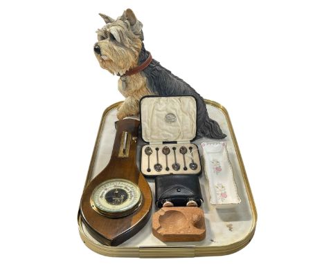 Tray lot with Pippin Terrier, silver coffee spoons, hedgehog ashtray, barometer, flask and pen tray.