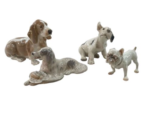Bing and Grondahl Seated Puppy 2028, Bulldog 1676, Royal Copenhagen Setter and Pheasant 1533 and Basset Hound 356.