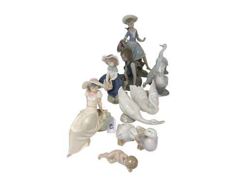 Three Lladro figures including Myrth in the Country and Nao pieces (12).