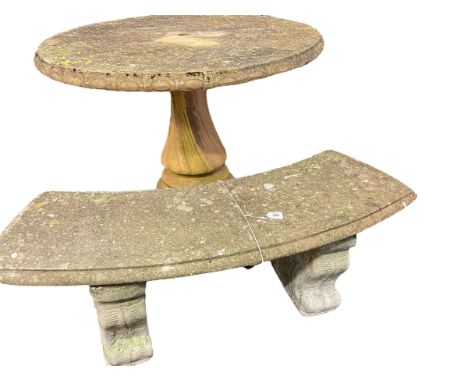 Circular weathered pedestal garden table 77cm x 107cm dia together with a curved weathered garden bench.