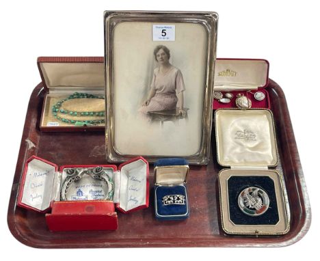 Silver photograph frames and jewellery, including Scottish brooch, Indian bangle, pendants, turquoise, pearl and diamond buck