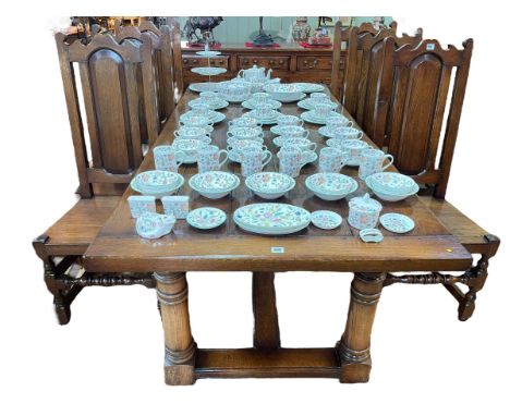 Eight piece oak dining suite comprising three drawer above three arched fielded panel doors sideboard, 90cm x 167.5cm x 46cm,