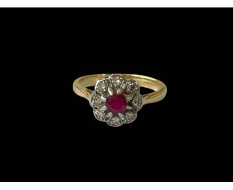 Ruby and diamond 18ct gold ring, size J/K.
