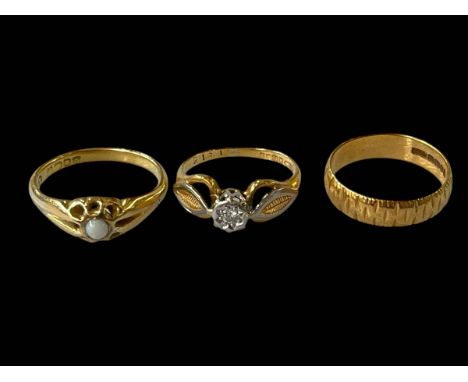 Three 18ct gold rings, including wedding band, opal and diamond.