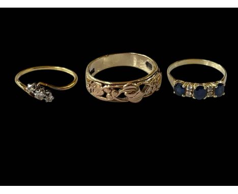 14k gold sapphire and diamond ring, 18ct three-stone diamond ring and 9ct gold ring (3).