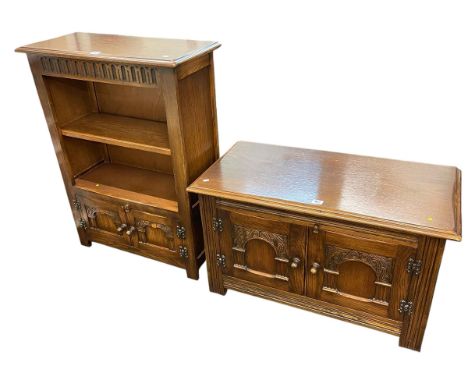 Oak two door open bookcase 87cm x 66cm x 30cm together with a similar two-door low cabinet, 48cm x 81cm x 41cm.