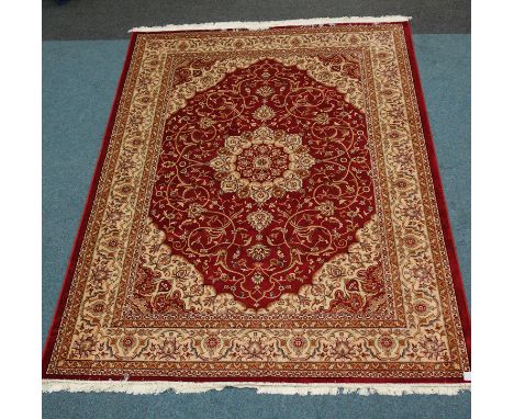 Red ground Keshan pattern carpet 280 x 200cm Condition Report Click here for further images, condition, auction times &amp; d