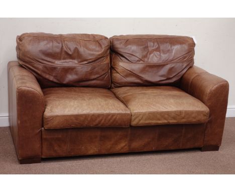 Two seat sofa upholstered in tan leather, W180cm Condition Report Click here for further images, condition, auction times & d