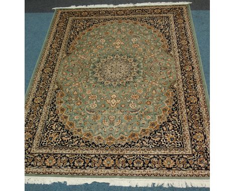 Green ground Keshan pattern carpet, 280 x 200cm Condition Report Click here for further images, condition, auction times &amp