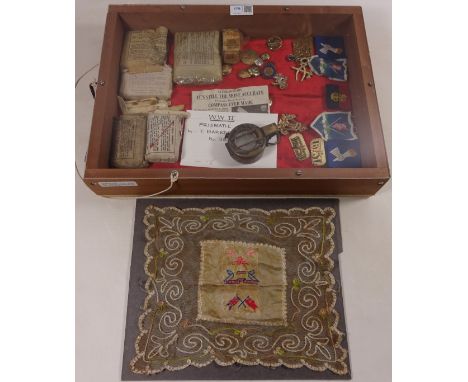 Military marching compass, Queens Royal Lancers service badge WW I silk and other related items in display case  Condition Re