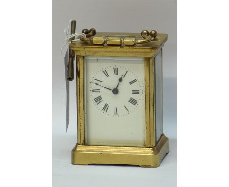 Brass carriage timepiece with white enamel dial, H14cm Condition Report Click here for further images, condition, auction tim