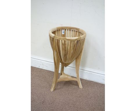 Hardwood circular planter on three legs, H55cm Condition Report Click here for further images, condition, auction times & del