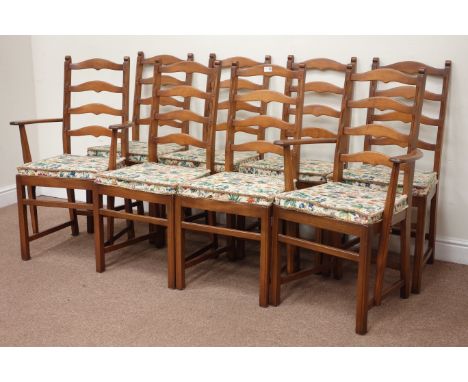 Set of eight Ercol ladder back dining chairs including two elbow chirs with loose seat pads (8) Condition Report Click here f