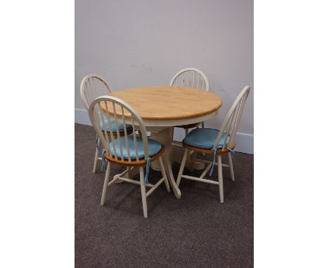 Circular lightwood extending dining table with painted base with fourhoop & stick back chairs, H76cm D107cm -W150cm (extended