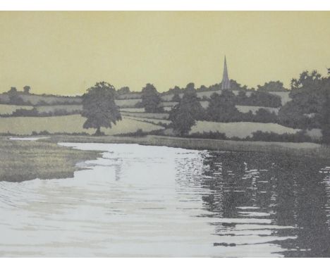 A framed and glazed limited edition print (51/151), riverscape with village in distance, indistinctly signed. H.60xW.53cm 