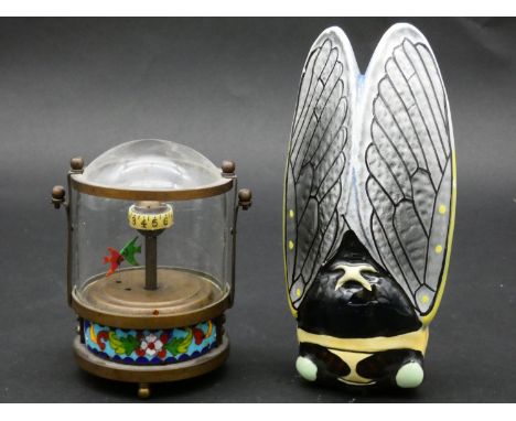 An animated vintage angel fish aquarium clock with moving fish, brass base with cloisonne enamel and a ceramic wall mounted c