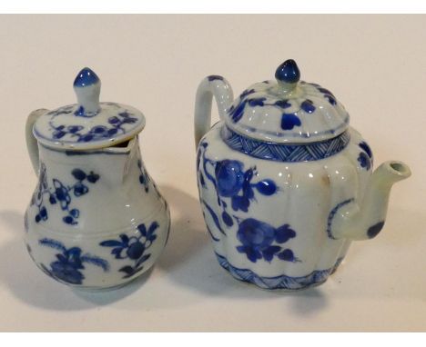 Two 18th century blue and white Chinese porcelain export ware pieces. A floral design teapot with scalloped form and a simila