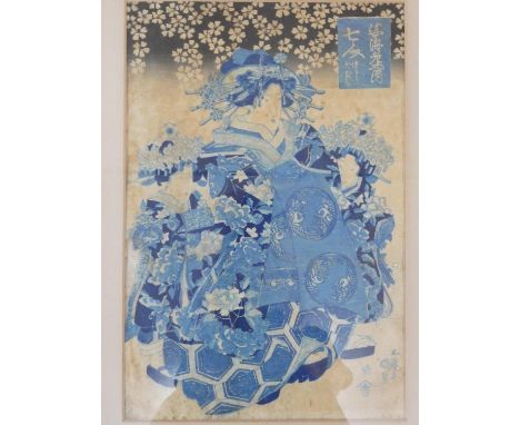 A lacquered framed and galzed antique Japanese woodblock print of a geisha in a crane design kimono, peach blossom, with arti