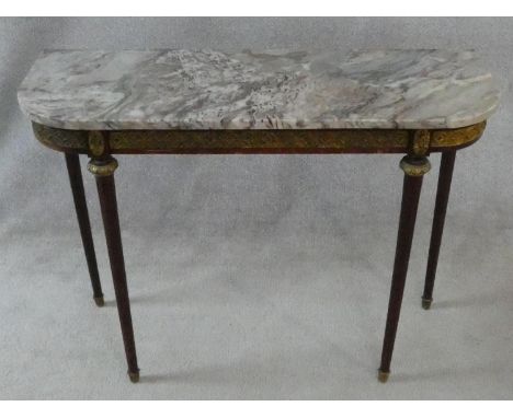 A Louis XVI style mahogany console table with grey veined marble top and ormolu mounts to the frieze and tapering fluted supp