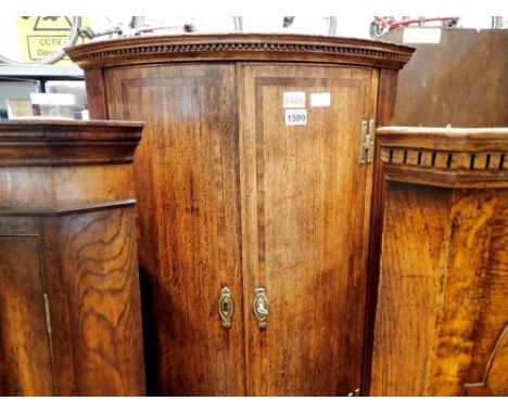George III crossbanded oak corner cabinet, two door with single shelf, H: 95cm. Not available for in-house P&amp;P