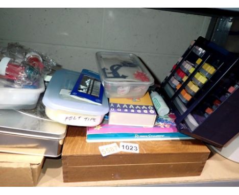 Shelf of art and crafting equipment and accessories including an artist box with oil paints (used). Not available for in-hous