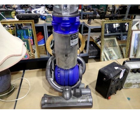 Dyson DC25 vacuum cleaner, tested and working. All electrical items in this lot have been PAT tested for safety and have pass