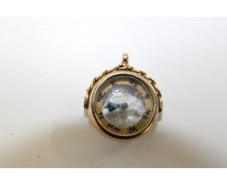 A 9ct gold compass fob 6.1 grams total 